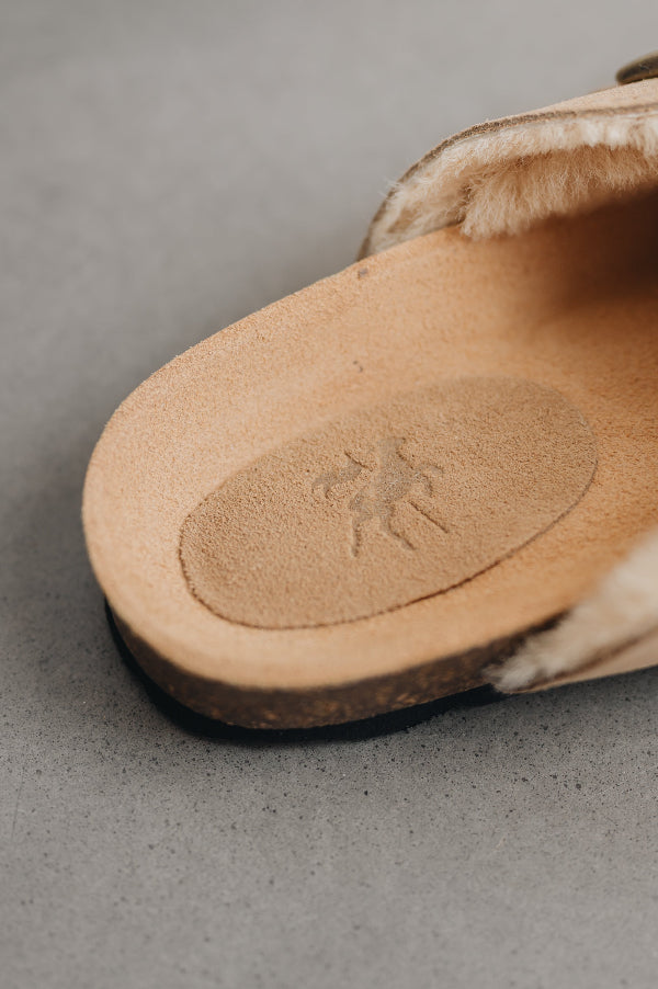 Close up of branding on the foot bed of the clog