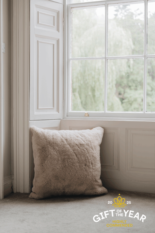 Large floor Cushion made from sheepskin on both sides.