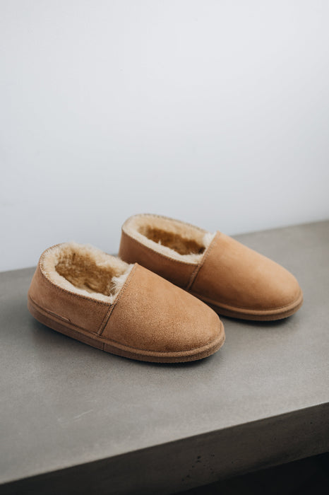 Top and side view of clean loafer style sheepskin slipper, hand crafted from Spanish merino sheepskin.