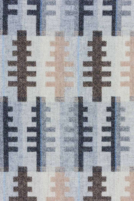 Wool throw with a FOREST woven tree pattern in cream, beige, brown and grey -by Melin Tregwynt