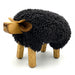 bull shaped foot stool with wooden head and legs and cotton twist body