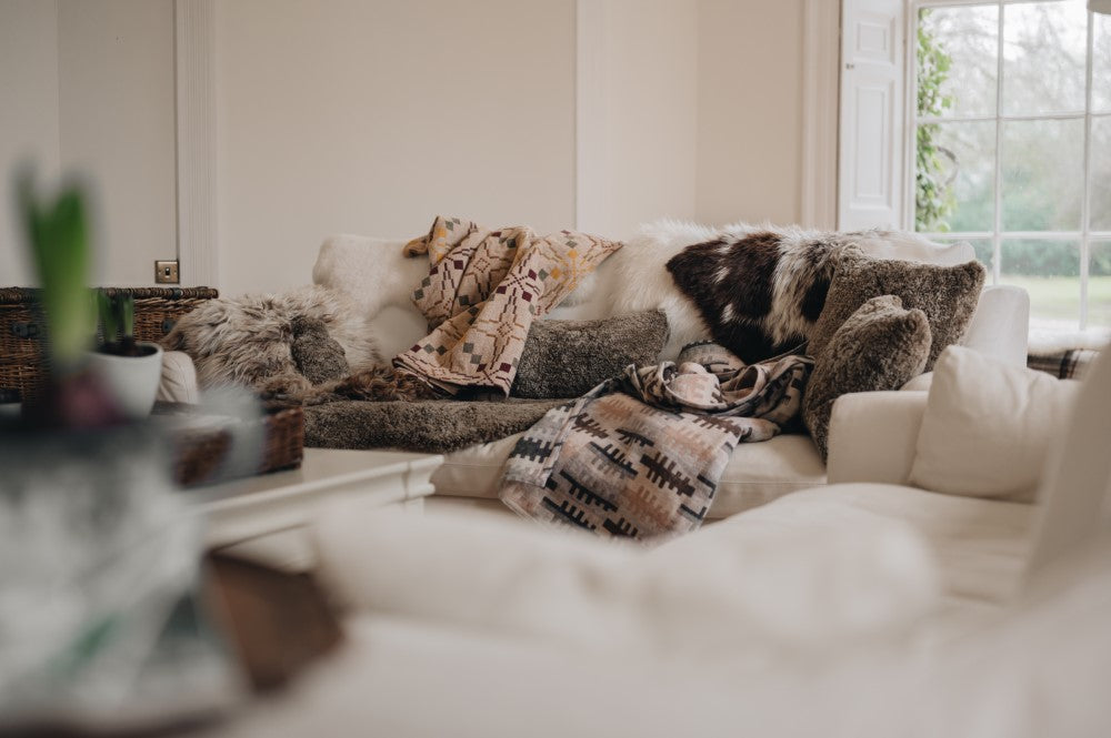 Sofa full of Sheepskin and Wool goods