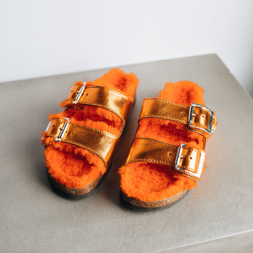 Medi Orange Sheepskin and Shiny Orange Letaher Straped Buckled Women's Sandals. A fleecy orange Sheepskin Lining, with a cork heel and Westmorland Branded tag.