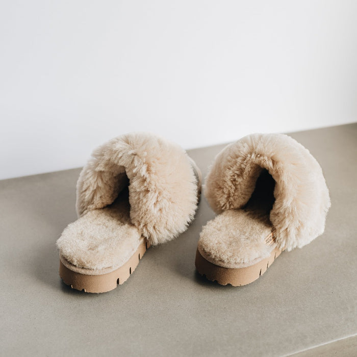 AW22 Veroncia Sheepskin Animal Print Slippers from Westmorland Sheepskin. Grey Zebra Print Slippers, with Sheepskin cuff and hard wearing brown sole.