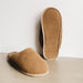 Outer suede sole of Robyn Unisex Sheepskin Slip On Soft Soled Slippers, in taupe. From Westmorland Sheepskins.