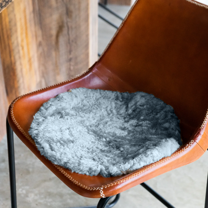 Sheepskin Chair Pad in Grey on Leather stool