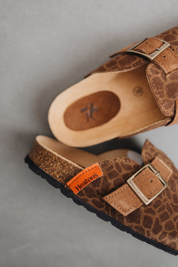 Close up of Lyra saharas adjustable strap and metal buckle