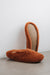 Curly merino sheepskin slip on slipper with curls on the outside and inside in a rich, warm rust colour. Slipper sole showing.
