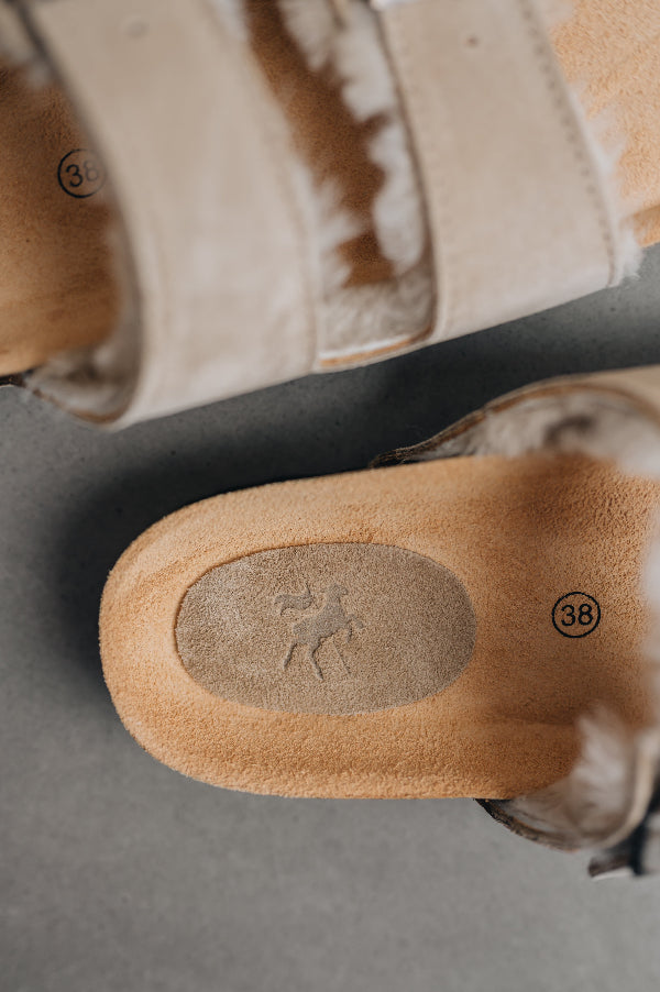 Close up on the branded patchwork of the shoe