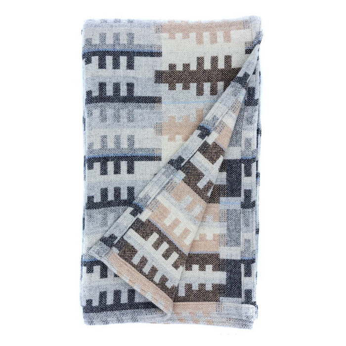Wool throw with a FOREST woven tree pattern in cream, beige, brown and grey -by Melin Tregwynt