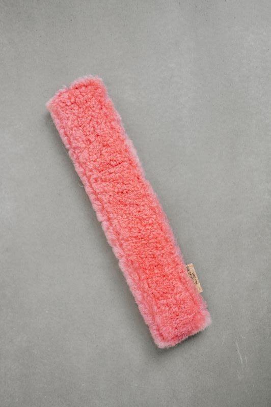 Pink sheepskin car seat cover