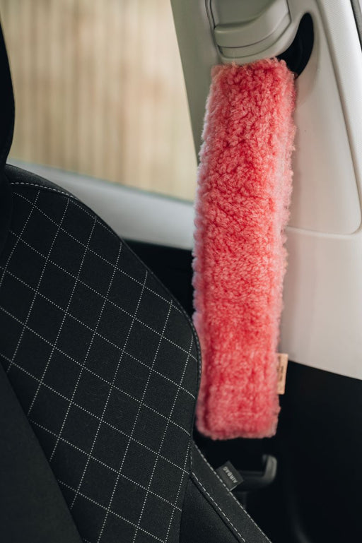 Pink sheepskin car seat cover