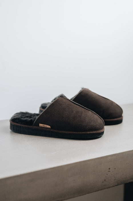 Side view of the brown men's sheepskin mule slipper called Walter.