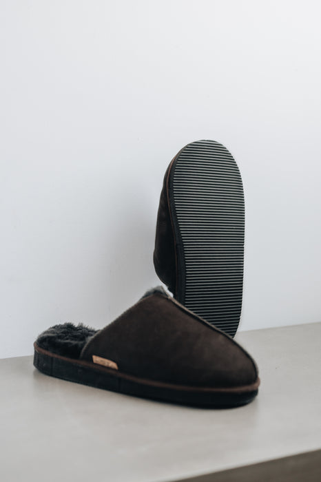 Bottom view showing the sole of the brown men's sheepskin mule slipper called Walter.