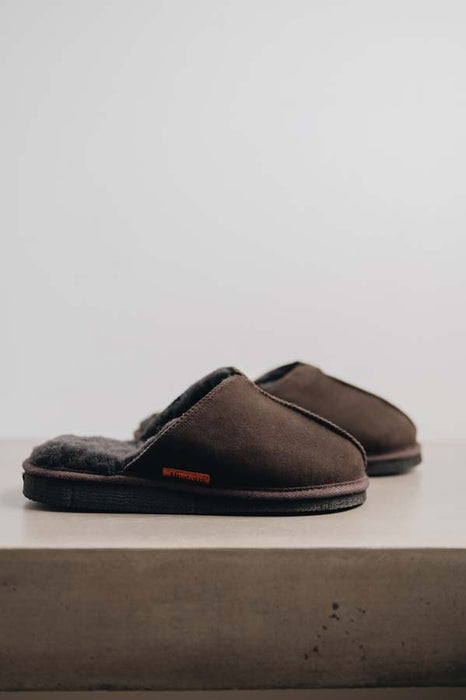 Side view of the brown women's sheepskin mule slipper called Willow.