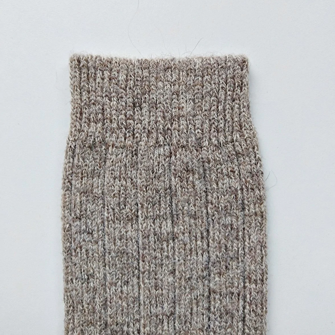 Anna Lungo Wool/Alpaca/Cotton/Hemp Long stone colour socks. Image shows close up of top of socks and their woven pattern.