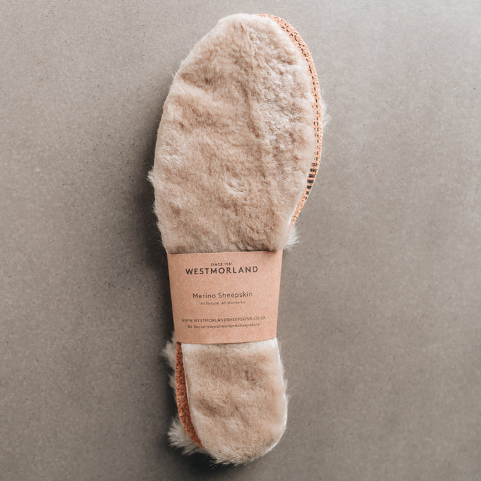 Natural colour Sheepskin Children's Cuttable Insoles. Cut to size. Wrapped in a cardboard informational sleave.