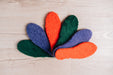 Lilac, Orange and Green AW22 colour Sheepskin Children's Cuttable Insoles. Cut to size. Displayed in a fan shape.