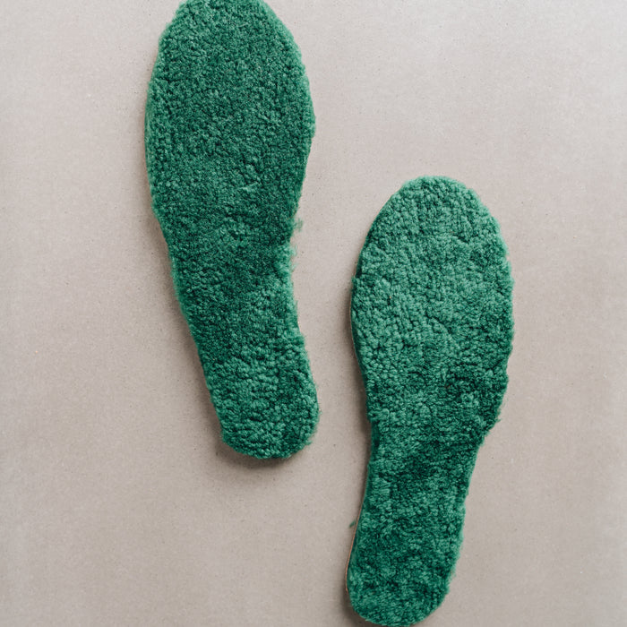 Green AW22 colour Sheepskin Children's Cuttable Insoles. Cut to size. Insoles layed out to show Sheepskin material.