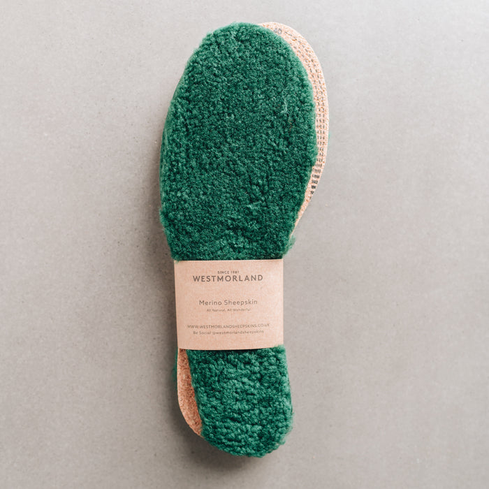 Green AW22 colour Sheepskin Children's Cuttable Insoles. Cut to size. Wrapped in a cardboard informational sleave.