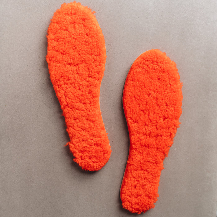 Orange AW22 colour Sheepskin Children's Cuttable Insoles. Cut to size. Insoles layed out to show Sheepskin material.