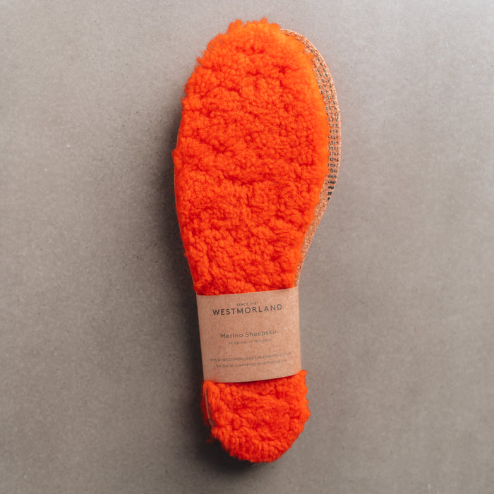 Orange AW22 colour Sheepskin Children's Cuttable Insoles. Cut to size. Wrapped in a cardboard informational sleave.