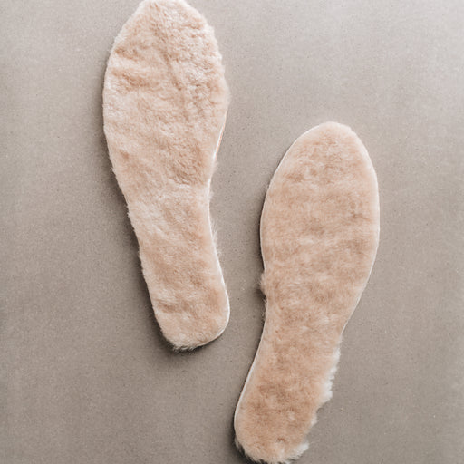 Natural colour Sheepskin Children's Cuttable Insoles. Insoles showing Sheepskin material.