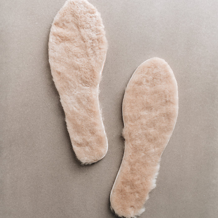 Natural colour Sheepskin Children's Cuttable Insoles. Insoles showing Sheepskin material.
