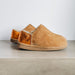 Side view of CADI Tan Sheepskin Women's Slipper, designed by Westmorland Sheepskins. The ankle has a contemporary Orange Foil look. Features a small branded cork tag sewn into outer trim.