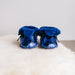 Front view of Westmorland Sheepskins Soft Soled Metallic Blue foil Baby Sheepskin Boots with a blue Sheepskin Cuff and laces.