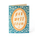 Get Well Soon Card. A verticle greetings card, with a blue and white floral trim. In the centre is a floral orange oval, with the writing reading 'Get Well Soon' at the centre. Comes with envelope.