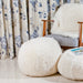 White rounded Sheepskin Ottoman / Footrest.