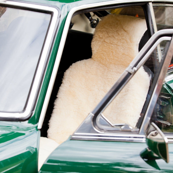 Natural Cream Sheepskin Car Seat Cover, features in a vintage Green car.