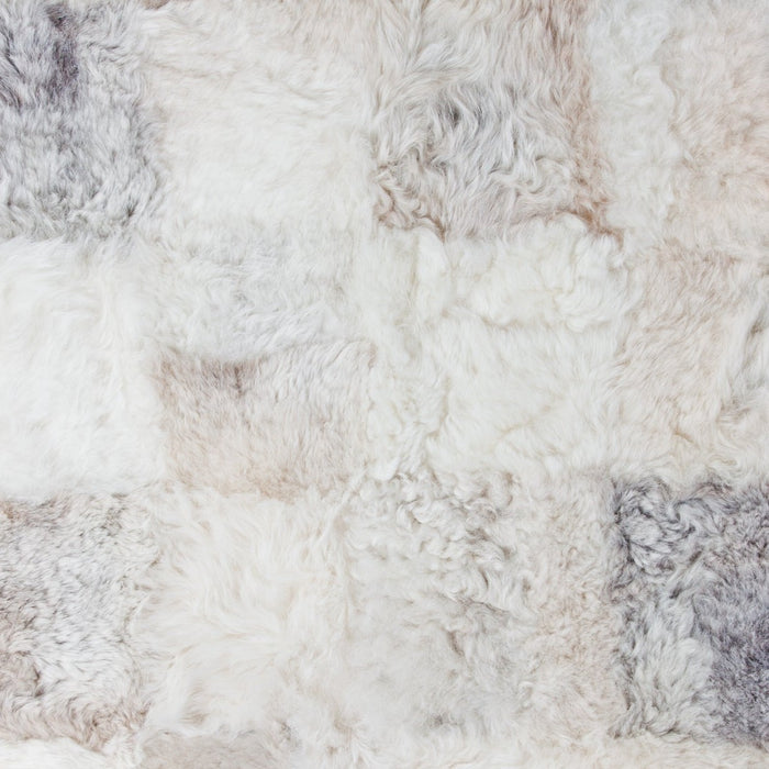 Close up of Patchwork Sheepskin White Icelandic Rug.