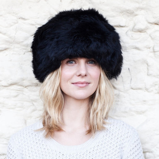 Model wears a black Sheepskin hat