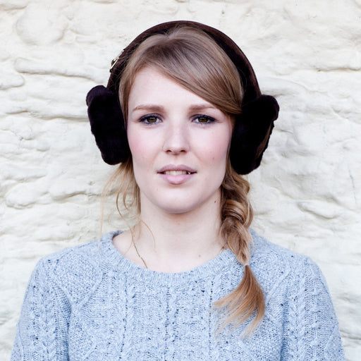 Brown Sheepskin Earmuffs, worn by a female model.