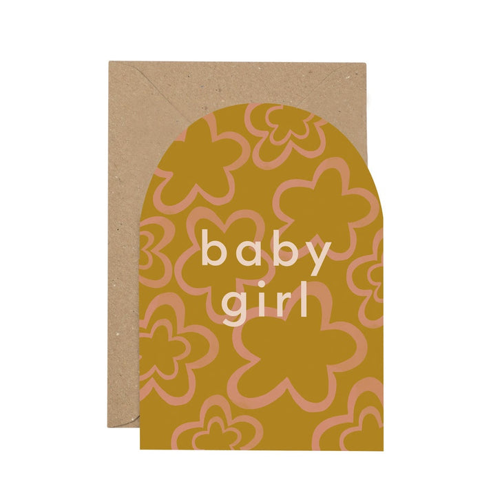 'baby girl' Curved Greetings Card. An olive green background with soft pink flower shapes, features white writing in the centre reading 'baby girl. Comes with an envelope.