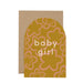 'baby girl' Curved Greetings Card. An olive green background with soft pink flower shapes, features white writing in the centre reading 'baby girl. Comes with an envelope.