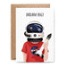 'Dream Big' Greetings Card. A White Vertical Rectangular card. Features a child wearing a red 'NASA' T-shirt and Space Helmet, holding a rocket. The caption at the top reads "Dream Big!". Comes with an envelope.
