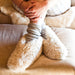 Ulla Creme Women's Thick Cream Sheepskin Soft Soled Slippers, worn by female model.