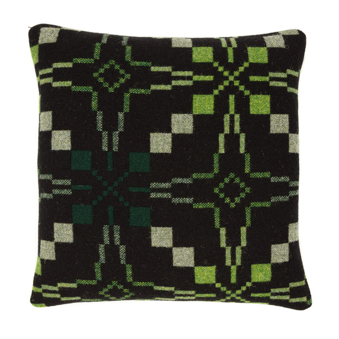 Melin Tregwynt Vintage Star Woven Wool Cushion in Woodland. A green and deep brown/black cushion with vintage star repeating pattern.